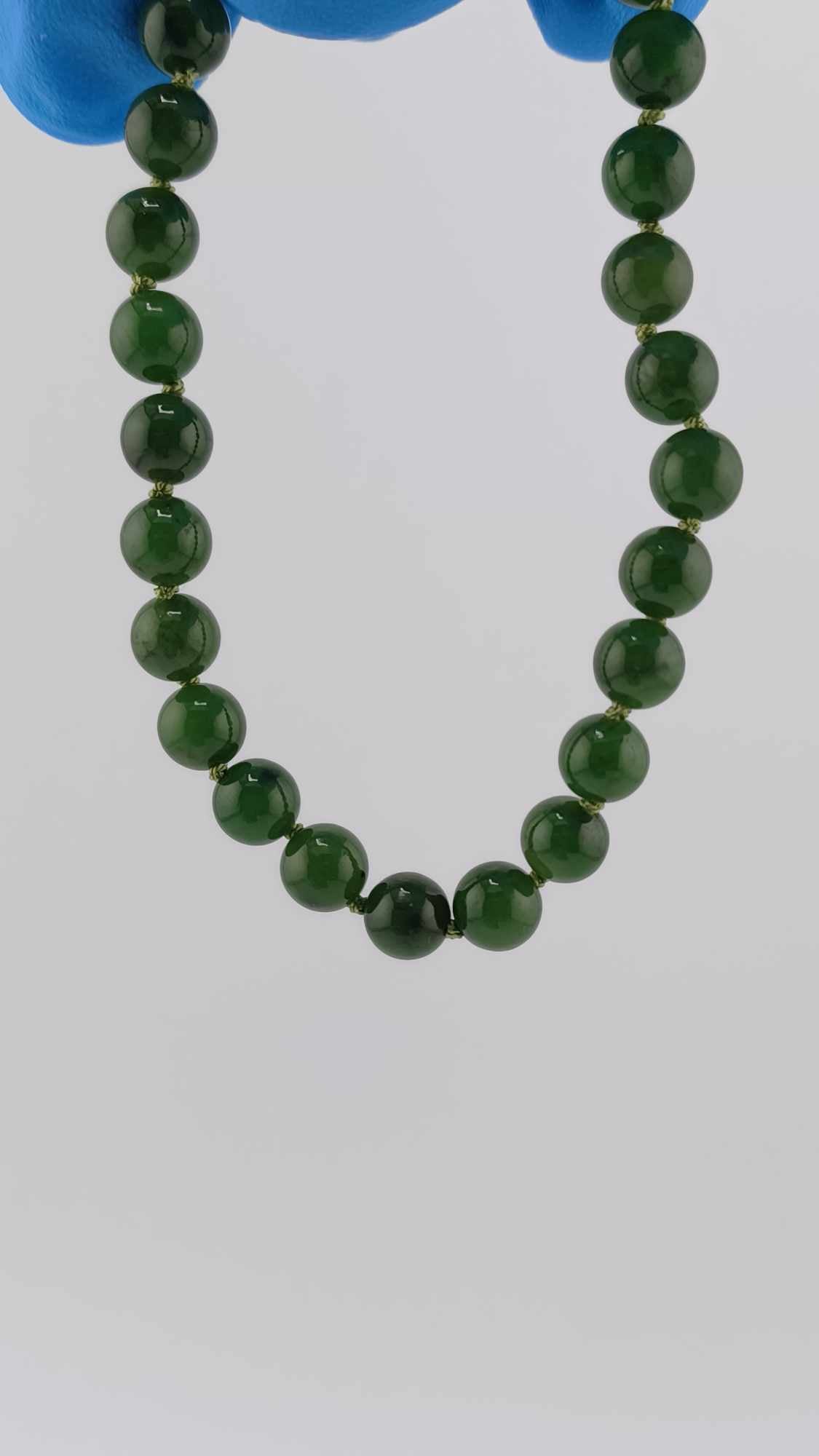 Holding to light British Columbia Nephrite Jade Beaded Bracelet Jade Jewelry Highly Translucent